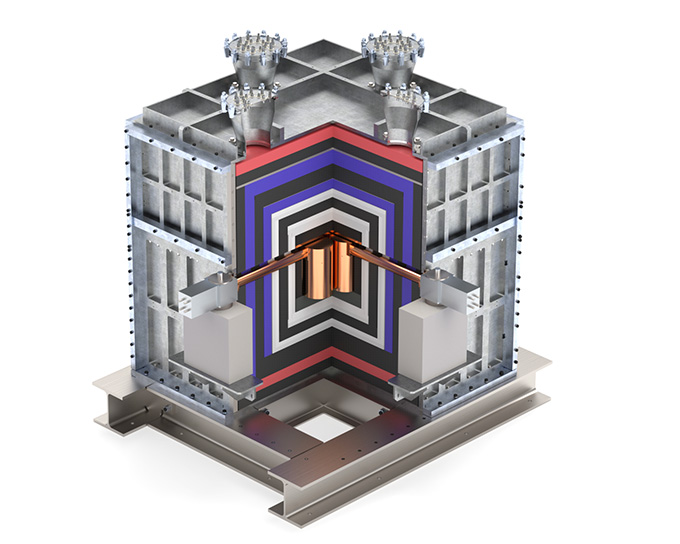 A Computer Rendering Shows Two Small Copper-Colored Cylinders Surrounded by A Layered Cube of Other Materials.